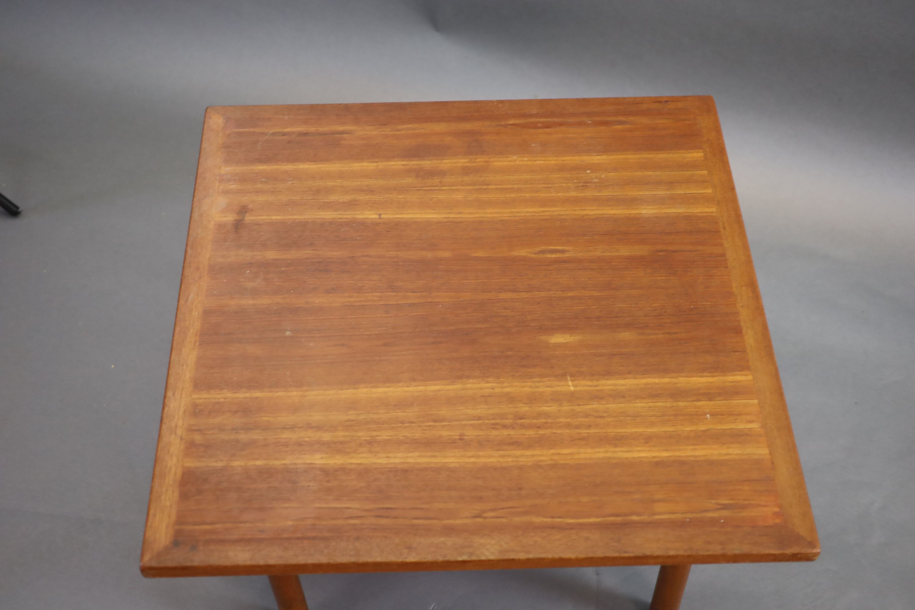 Hans Wegner for Andreas Tuck, a Danish teak coffee table, 85 x 85cm, 50cm high.